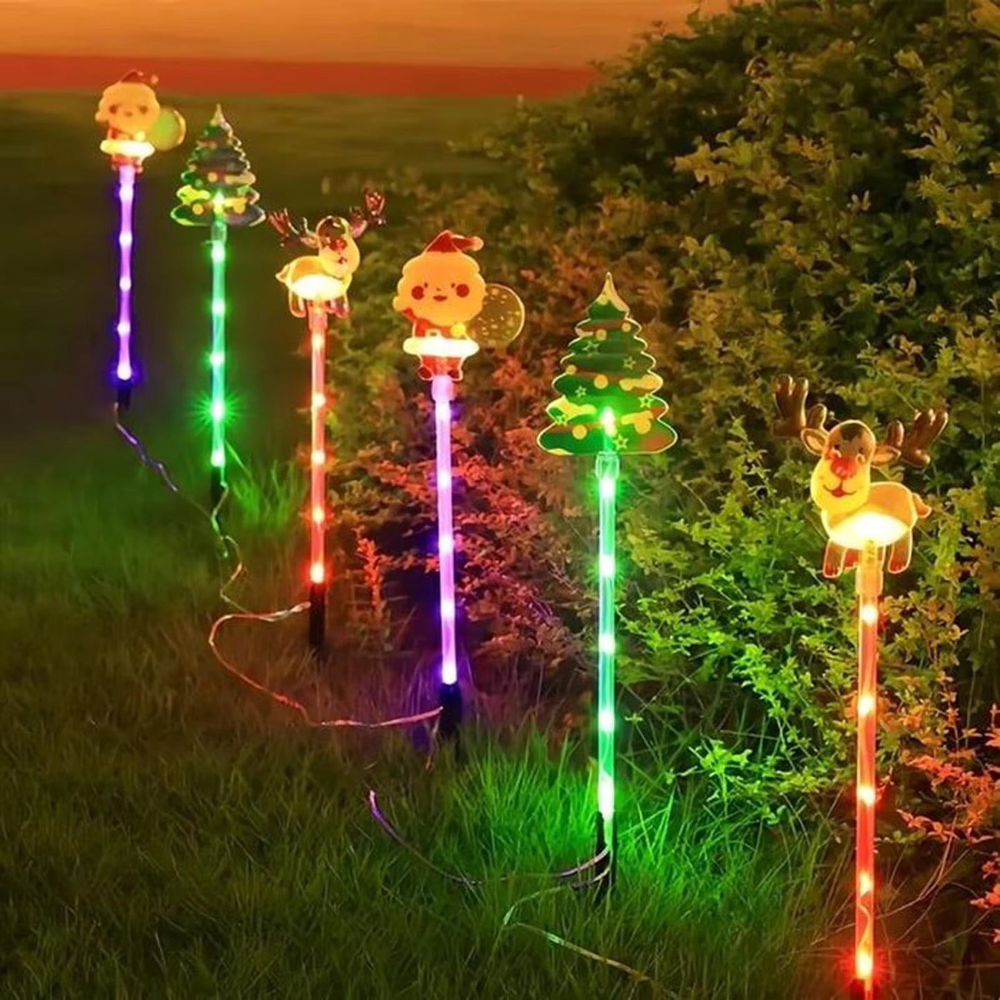🎅 6-Pack Solar Christmas Decorative Lights Christmas-Themed LED Fairy Lights Featuring Santa Claus, Christmas Trees, and Reindeer Plastic Material IP44 Waterproof Rating Ideal for Lawn and Garden Pathway Decorations Holiday Decorations